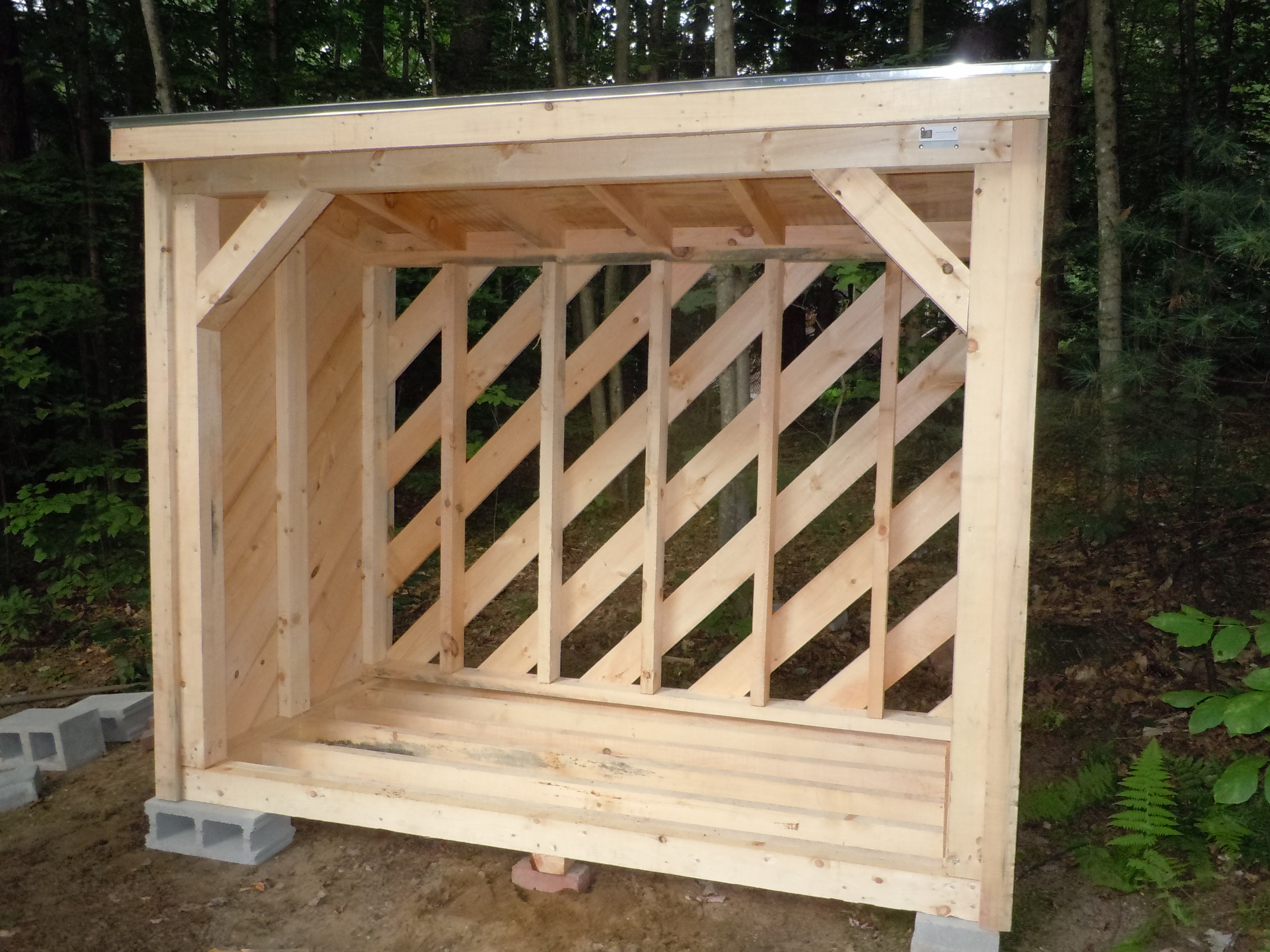 Build wood shed to hold 4 cords wood

